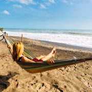 Woman relaxing on a beach in Colombia